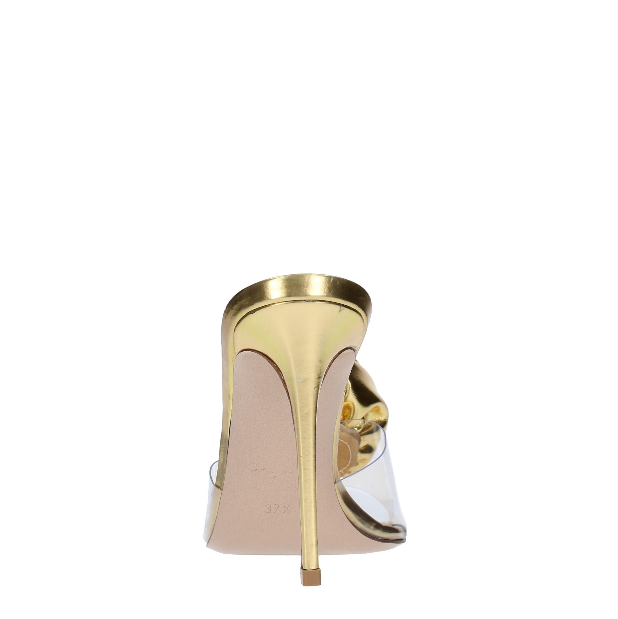 Mules in pelle e PVC 