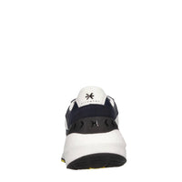 Sneakers in pelle e tessuto 