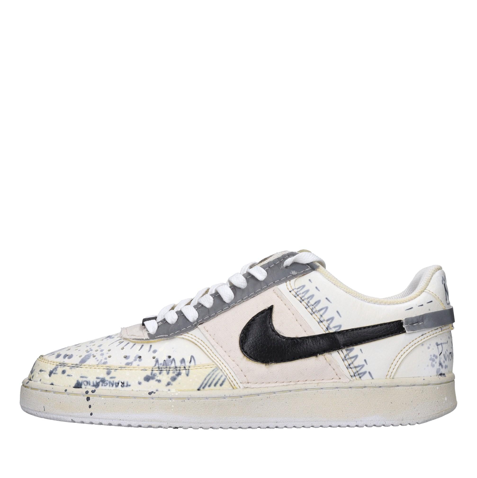 Sneakers in ecopelle e tessuto 