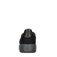 Sneakers in pelle e tessuto 