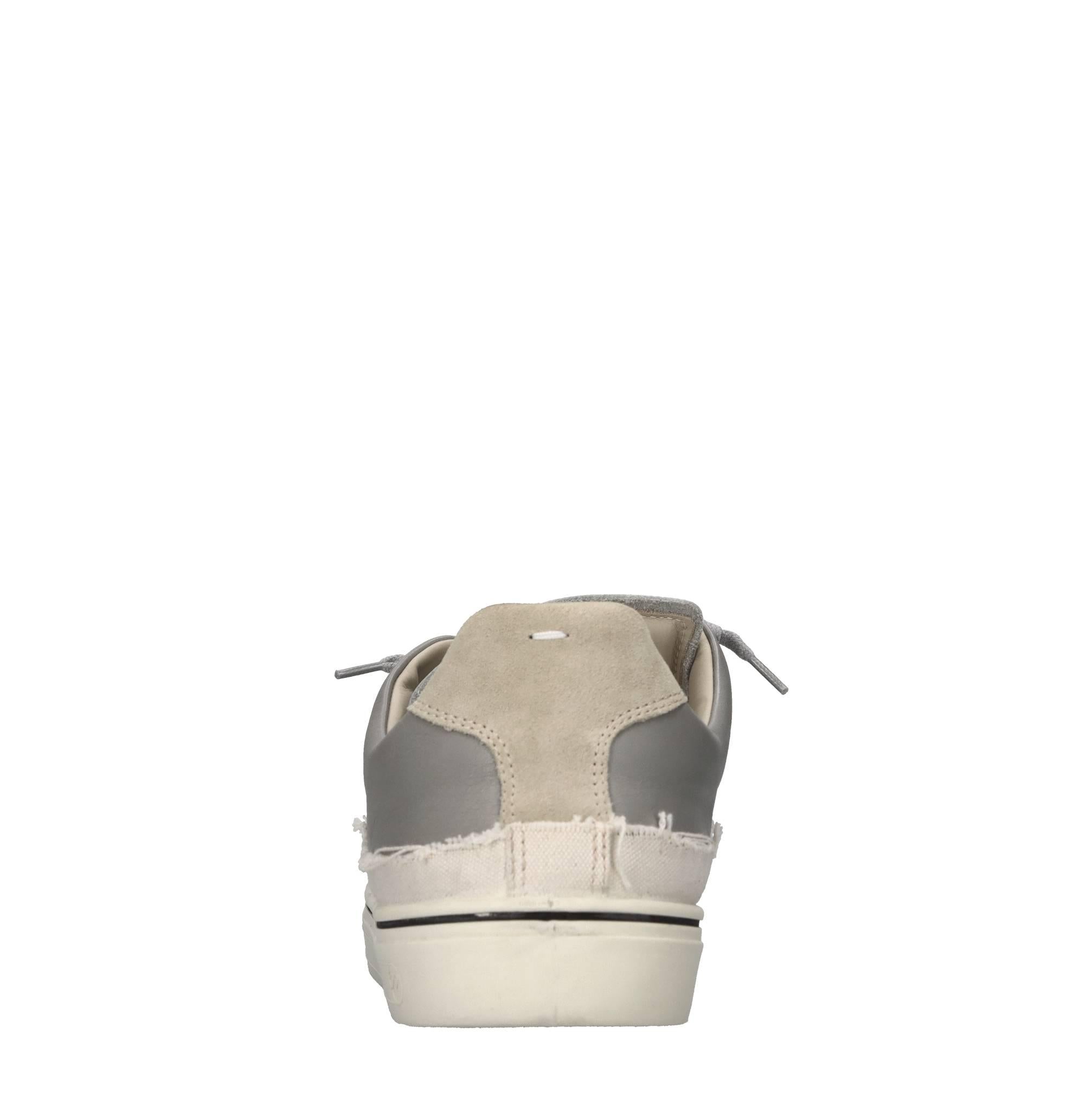 Sneakers in pelle e tessuto 