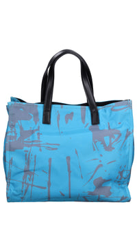Borsa in pelle e tessuto 