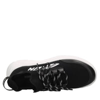 Sneakers in pelle e tessuto 