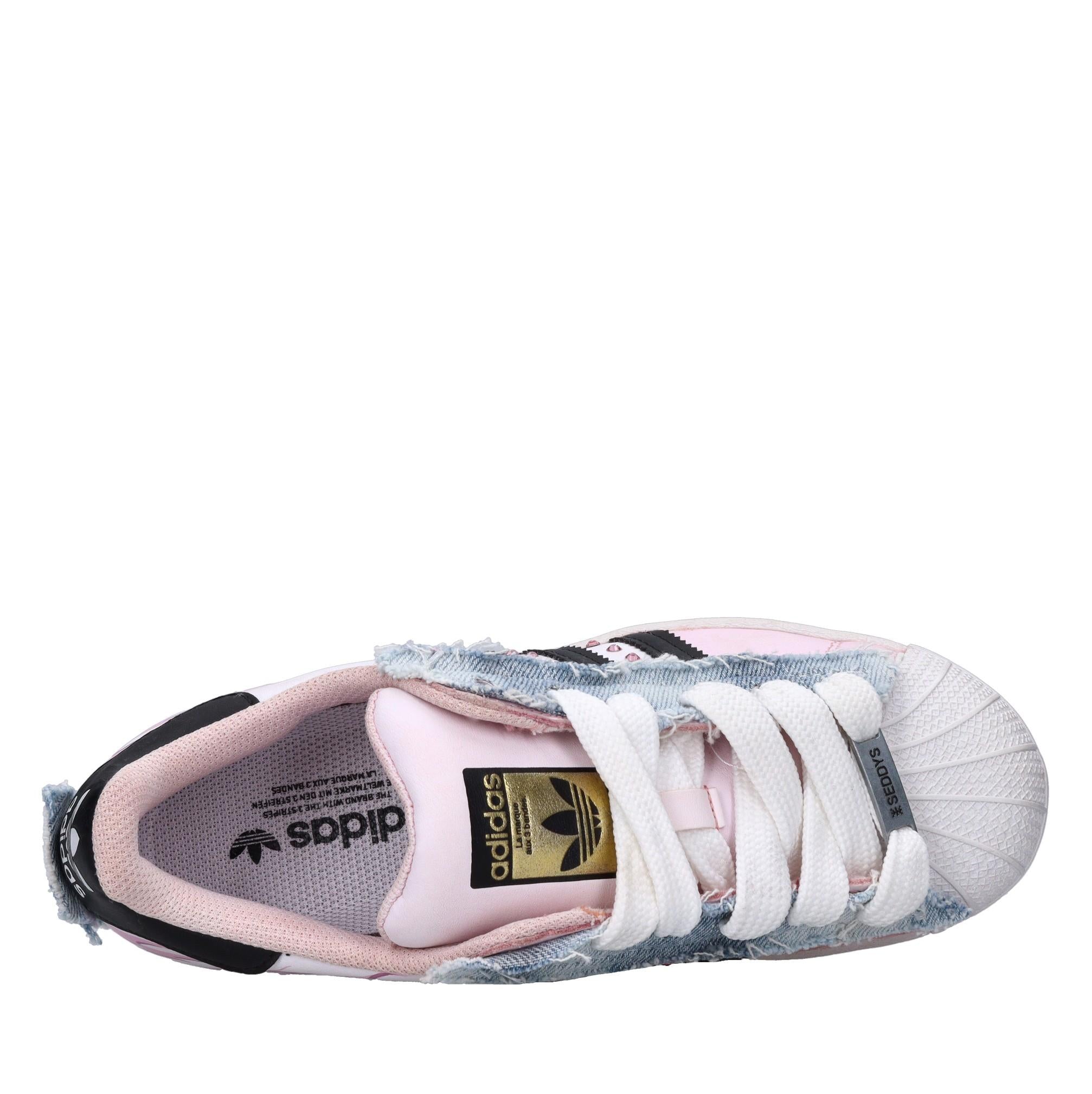 Sneakers in pelle e tessuto 
