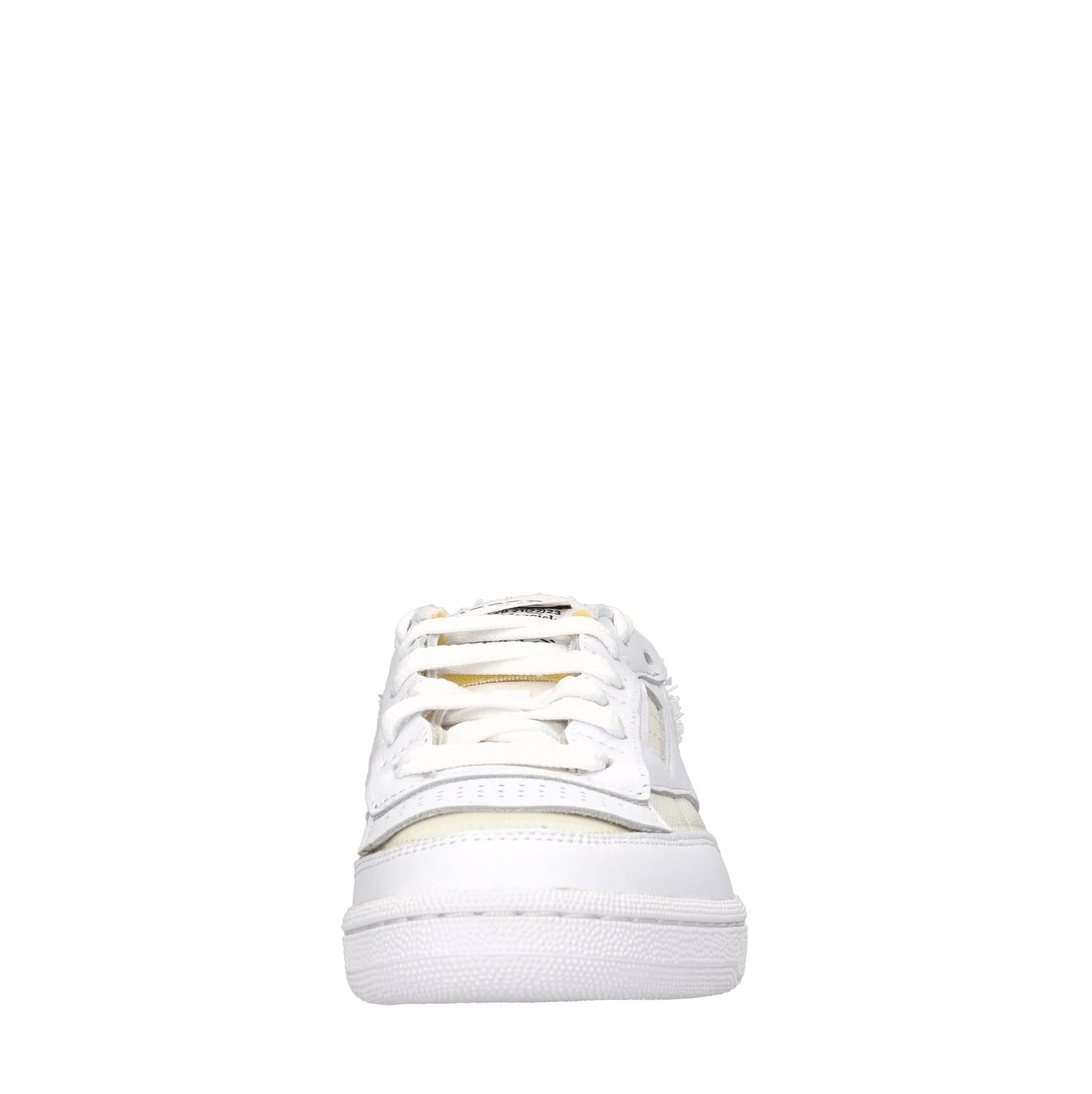 Sneakers in pelle e tessuto 