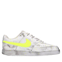 Sneakers in ecopelle e borchie 