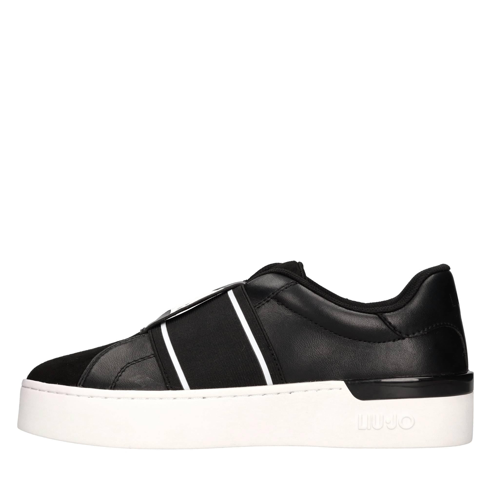 Sneakers in ecopelle e tessuto 