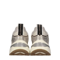 Sneakers in pelle, ecopelle e tessuto 