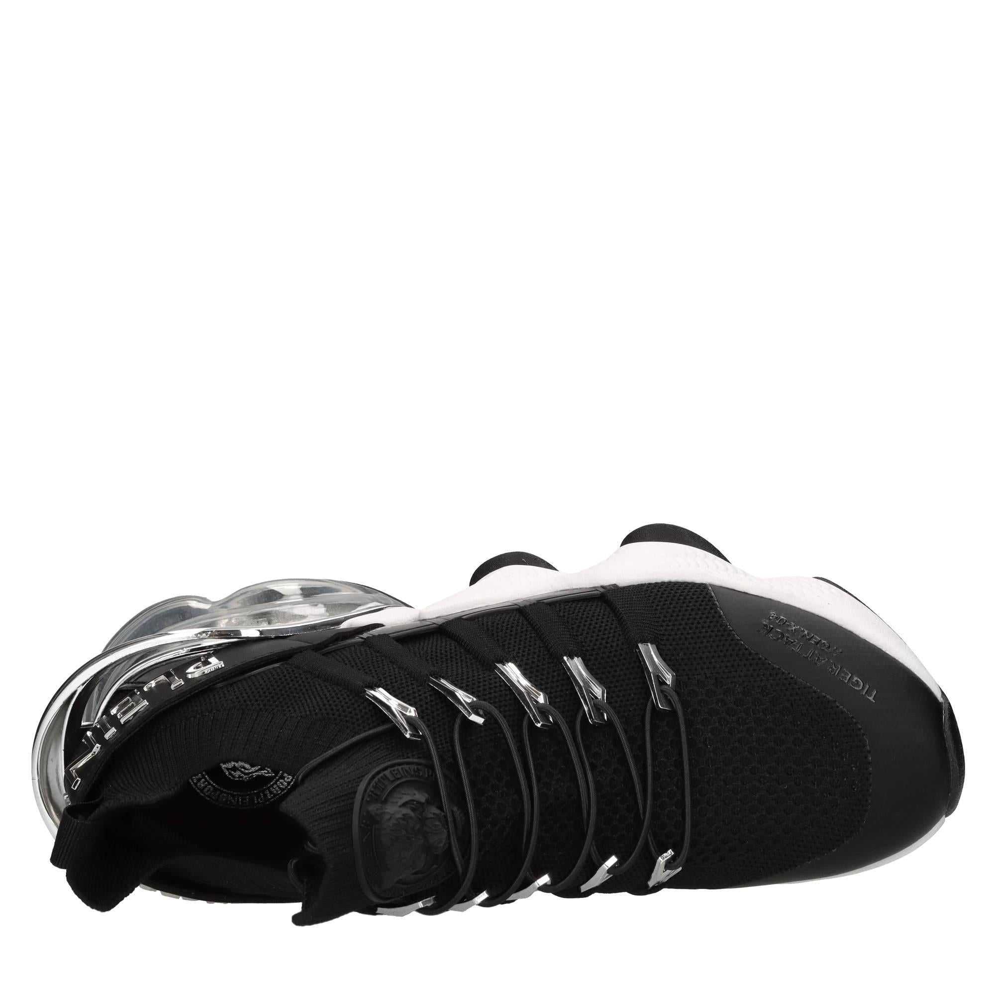 Sneakers in ecopelle e tessuto 