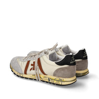 Sneakers in pelle ecopelle e tessuto 