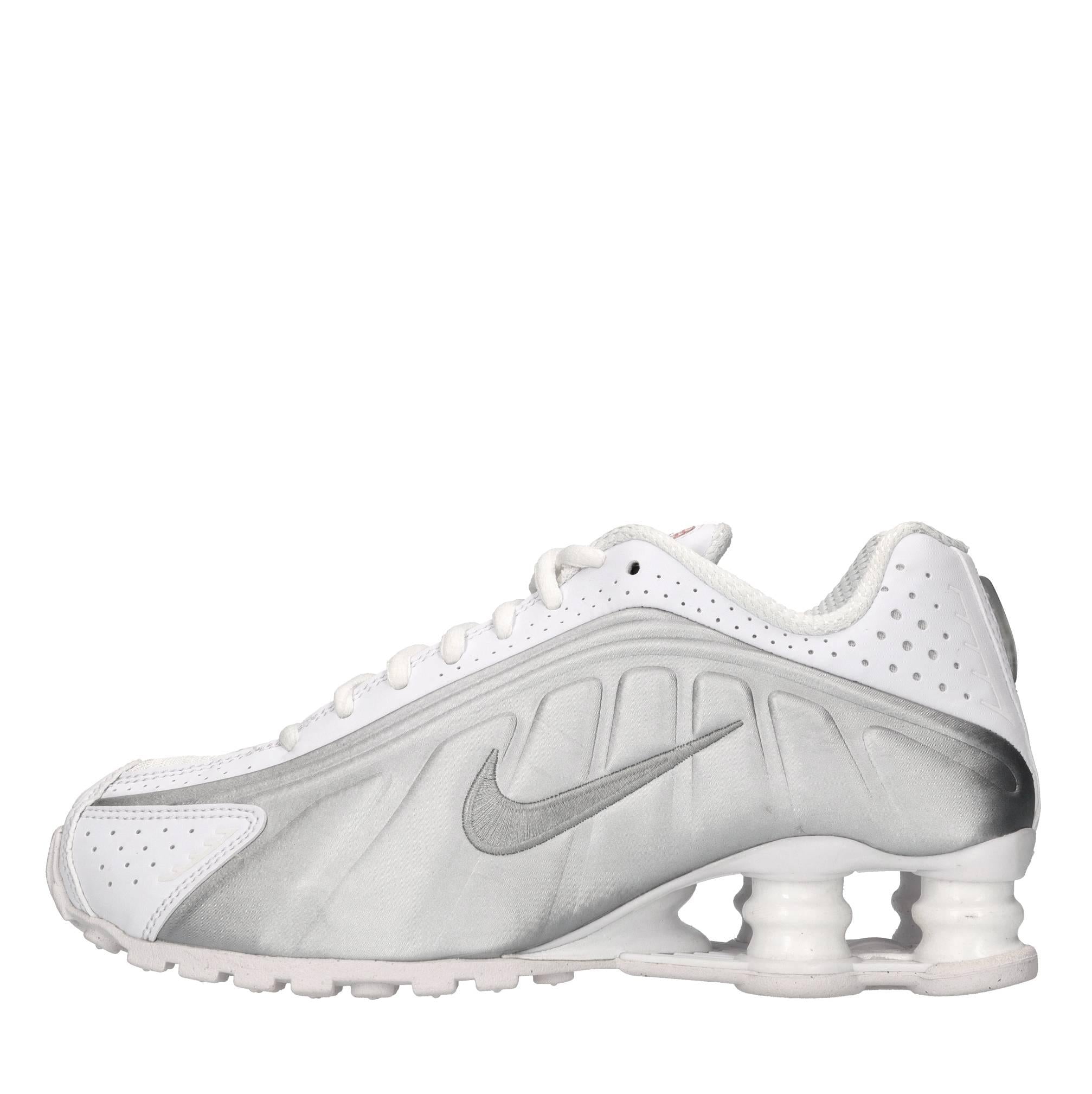 Sneakers in ecopelle e tessuto 