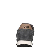 Sneakers in camoscio e tessuto 