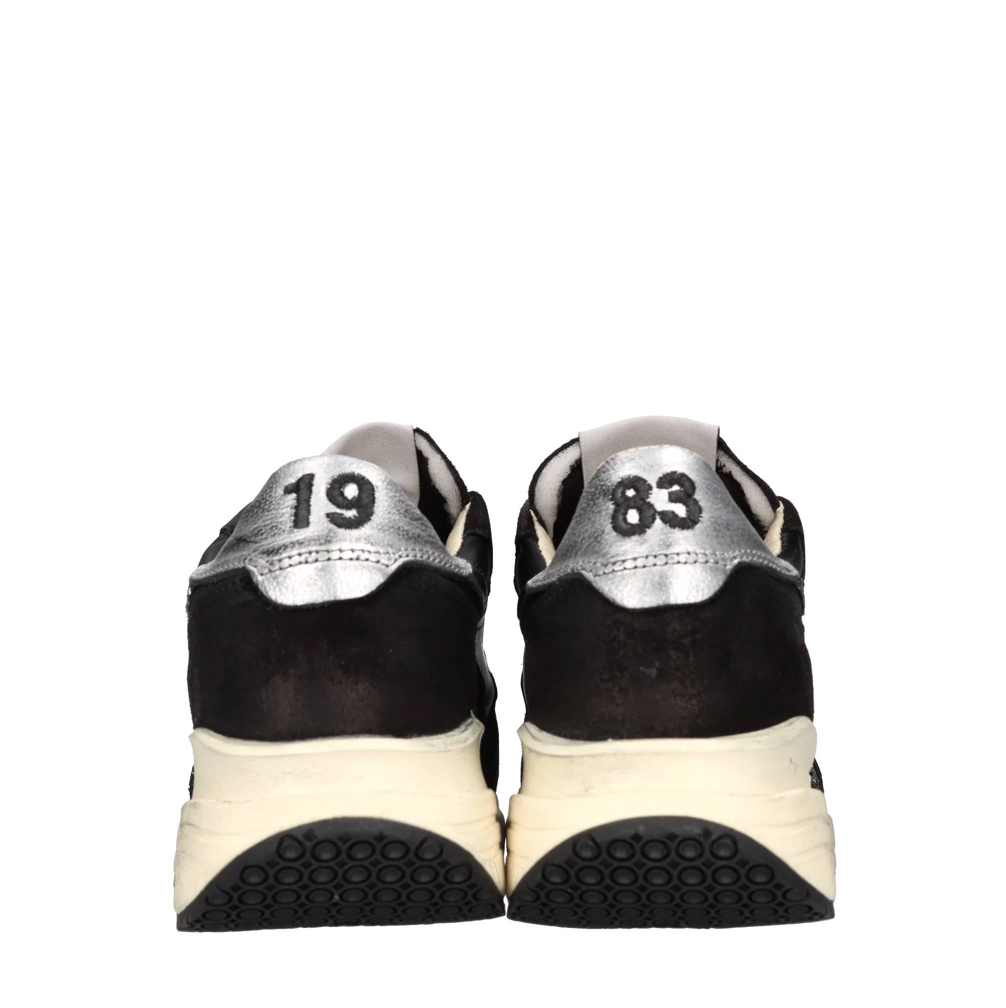 Sneakers in pelle e tessuto 