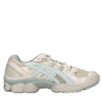 Sneakers in ecopelle e tessuto 