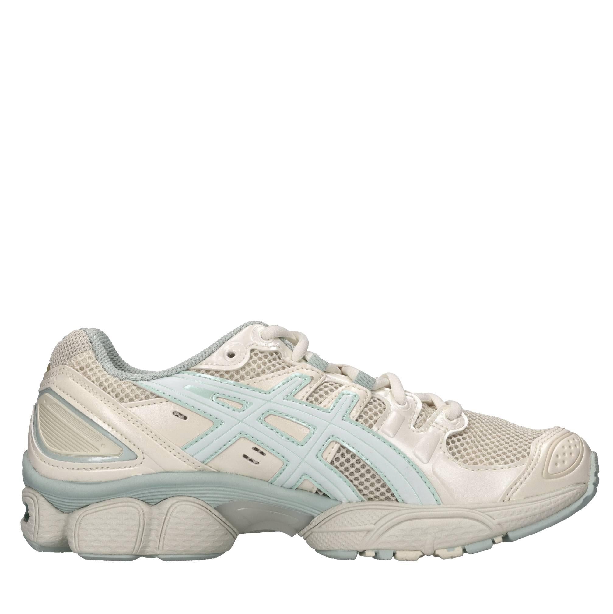 Sneakers in ecopelle e tessuto 