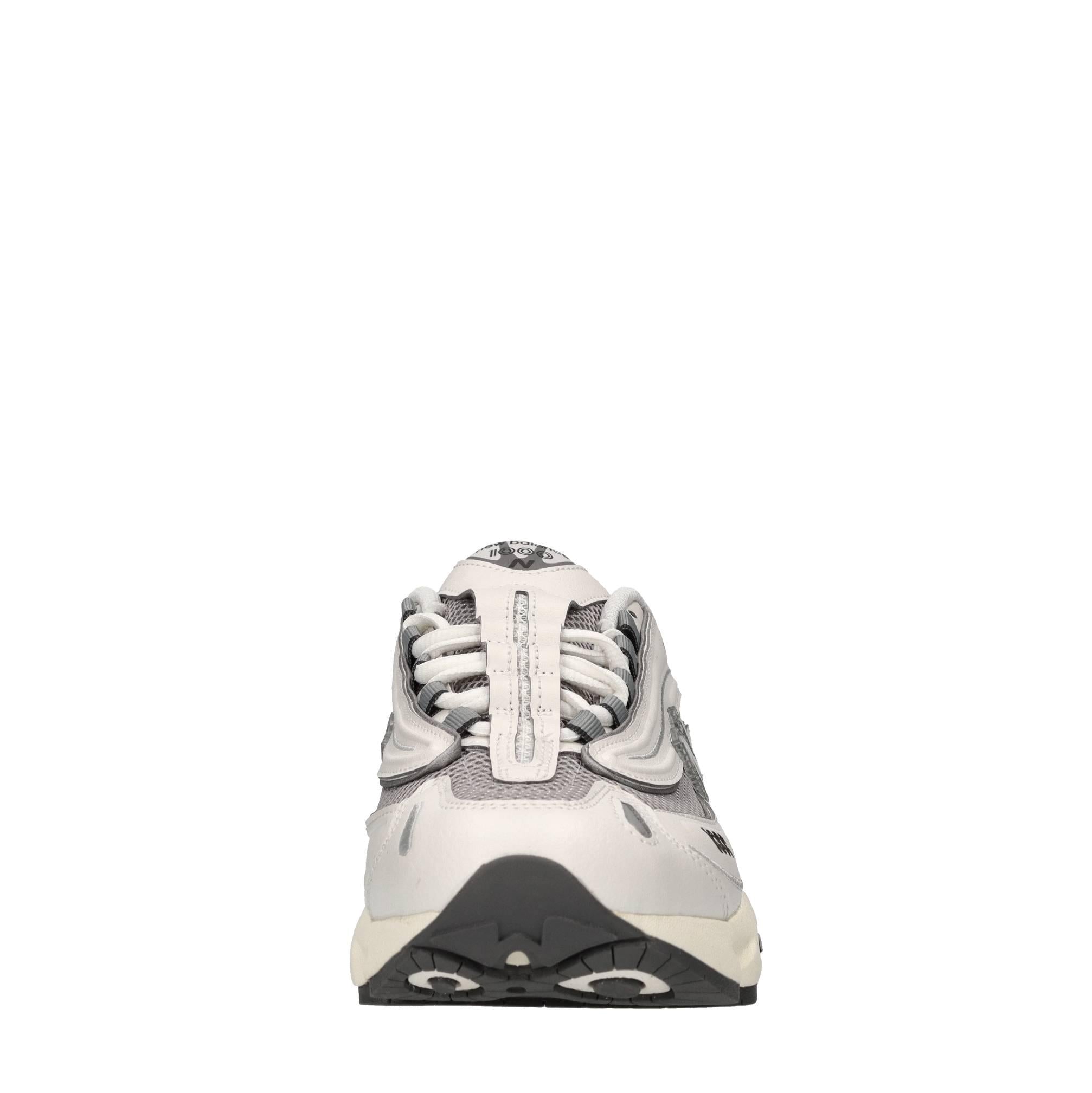 Sneakers in ecopelle e tessuto 