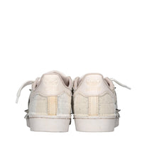 Sneakers in ecopelle e tessuto 
