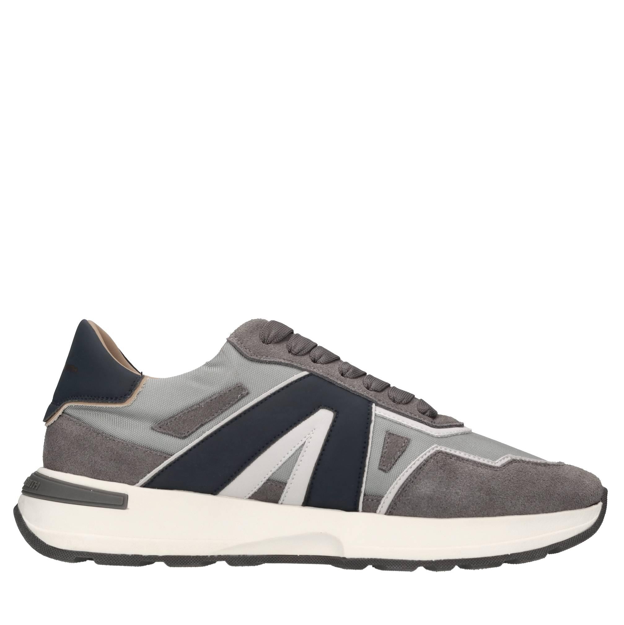 Sneakers in pelle e tessuto 