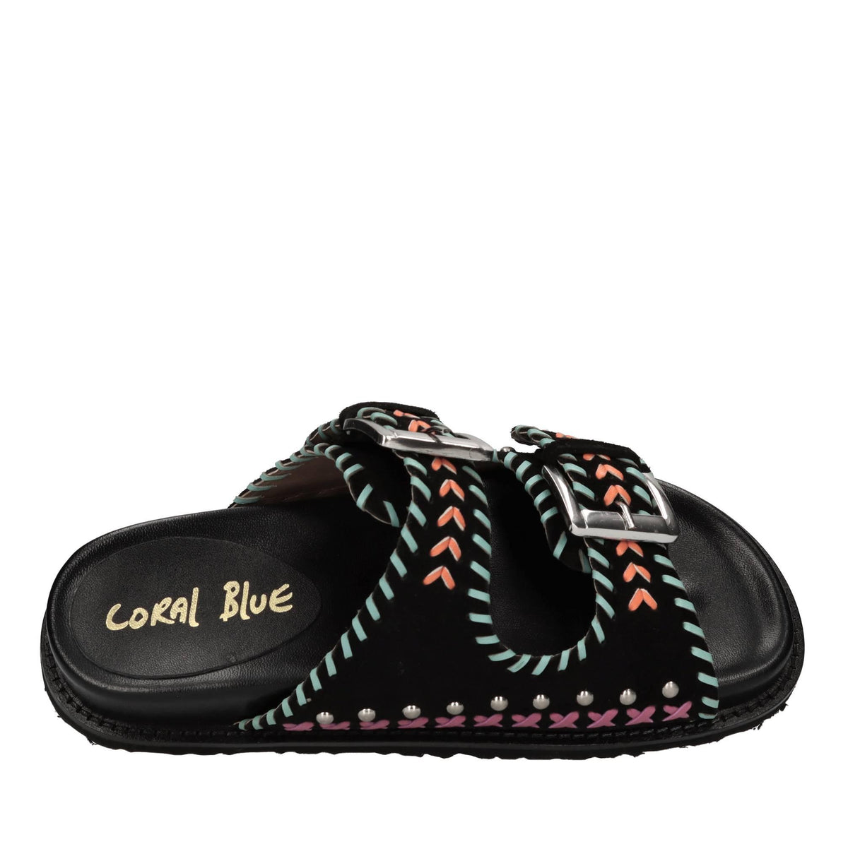 Mules in camoscio e pelle con borchie 