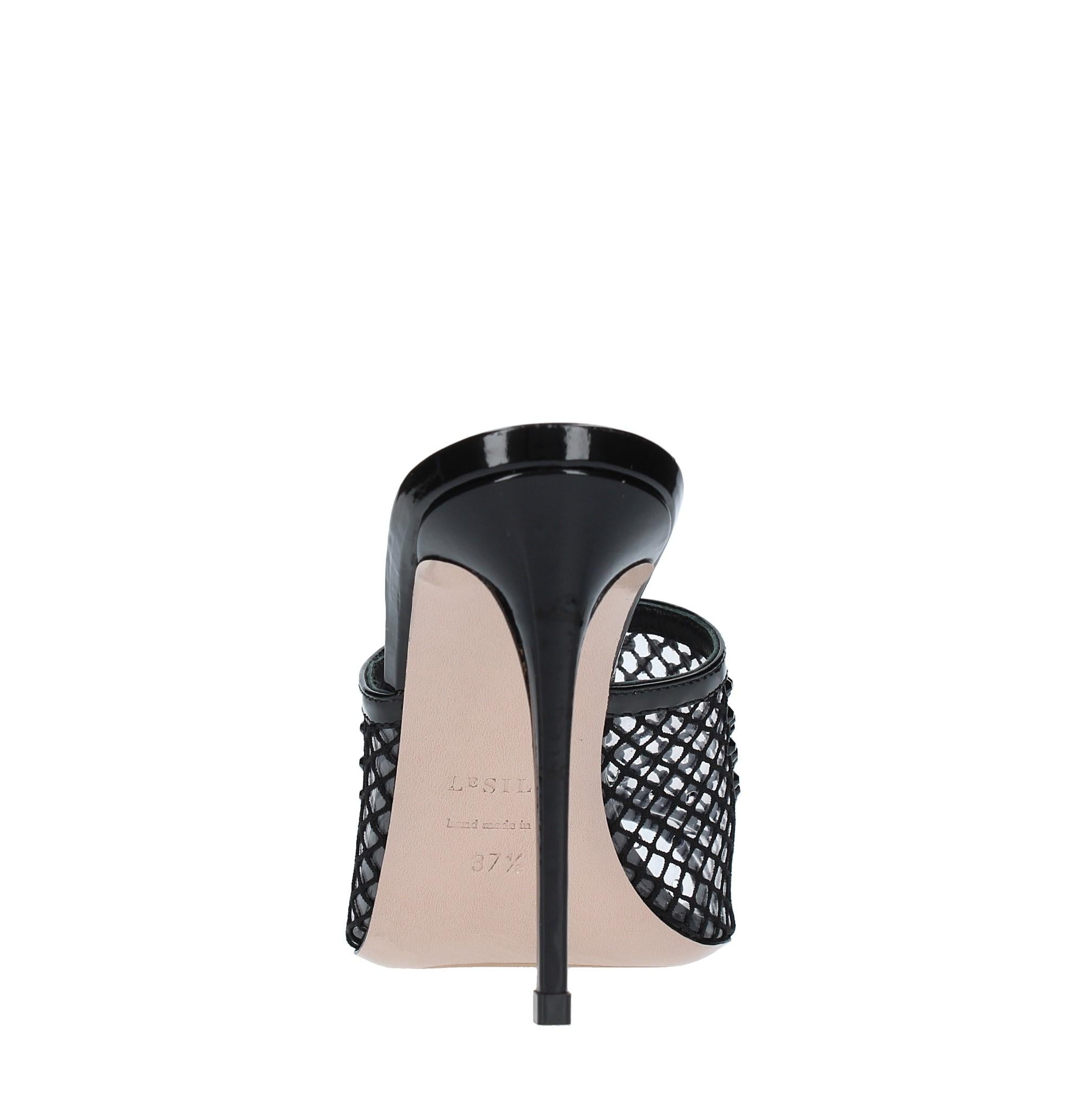 Mules in pelle tessuto e PVC 
