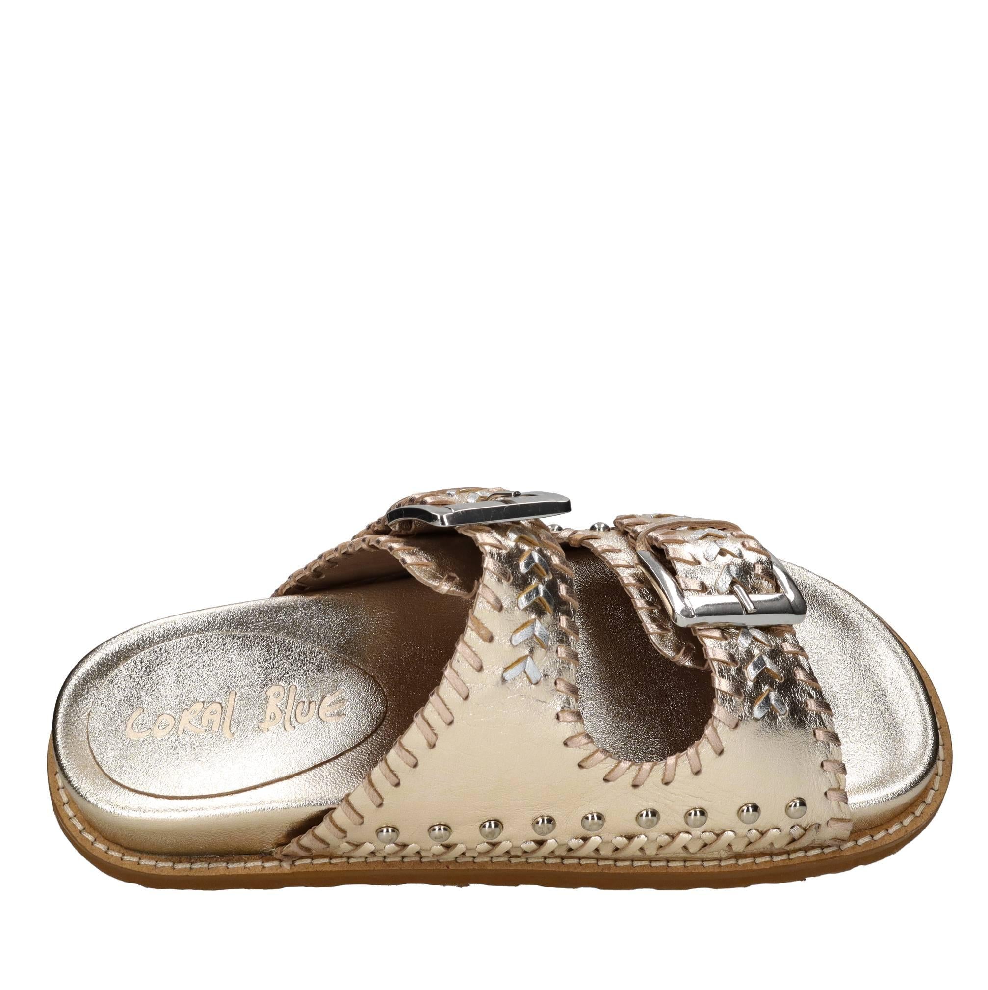 Mules in pelle con borchie 