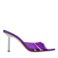 Mules in pelle e PVC 