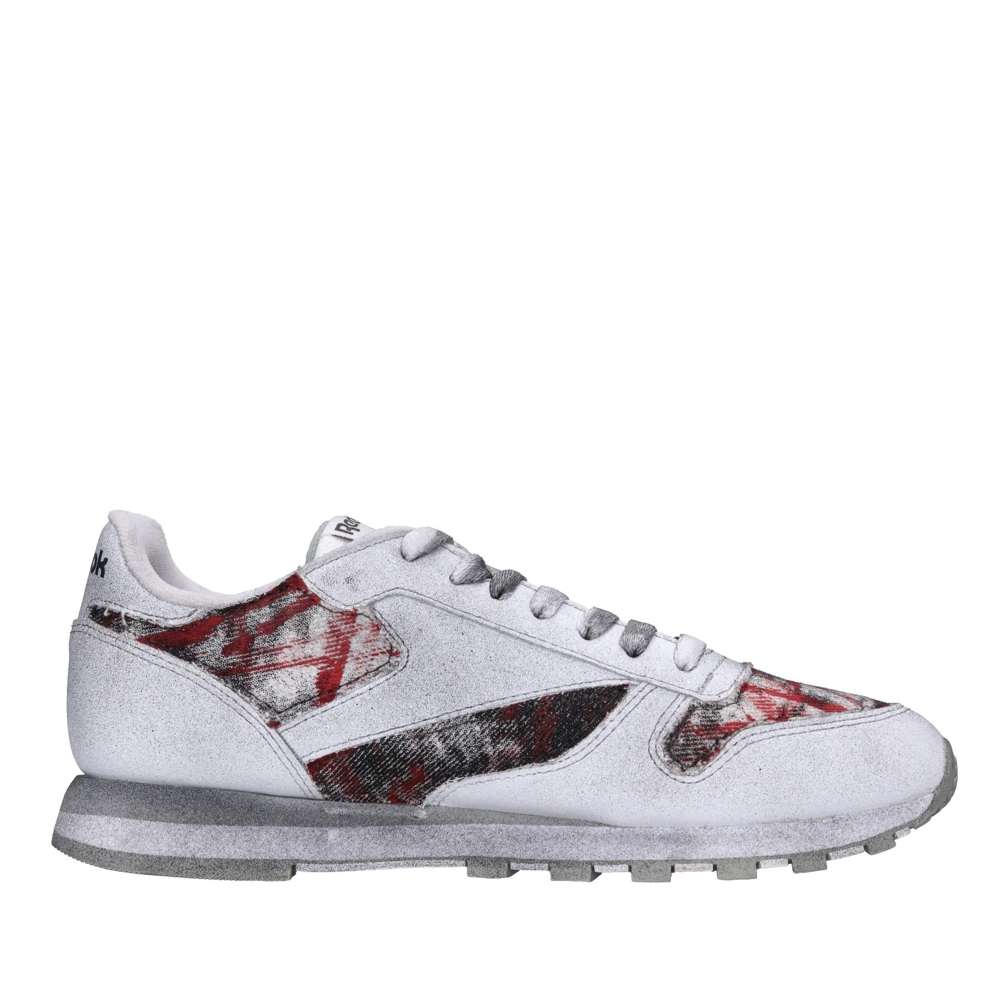 Sneakers in pelle e tessuto 