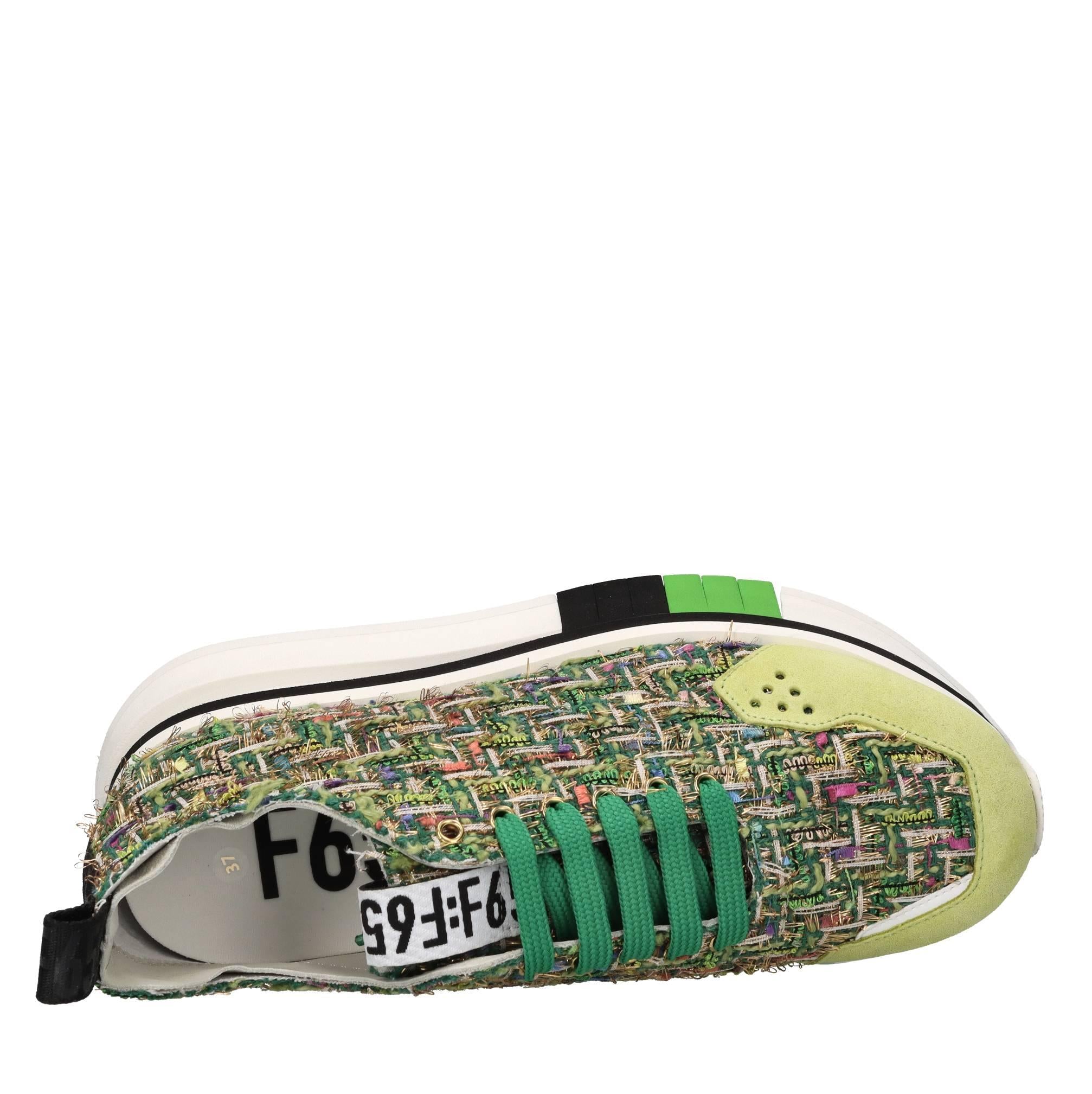 Sneakers in tessuto con inserti in camoscio 