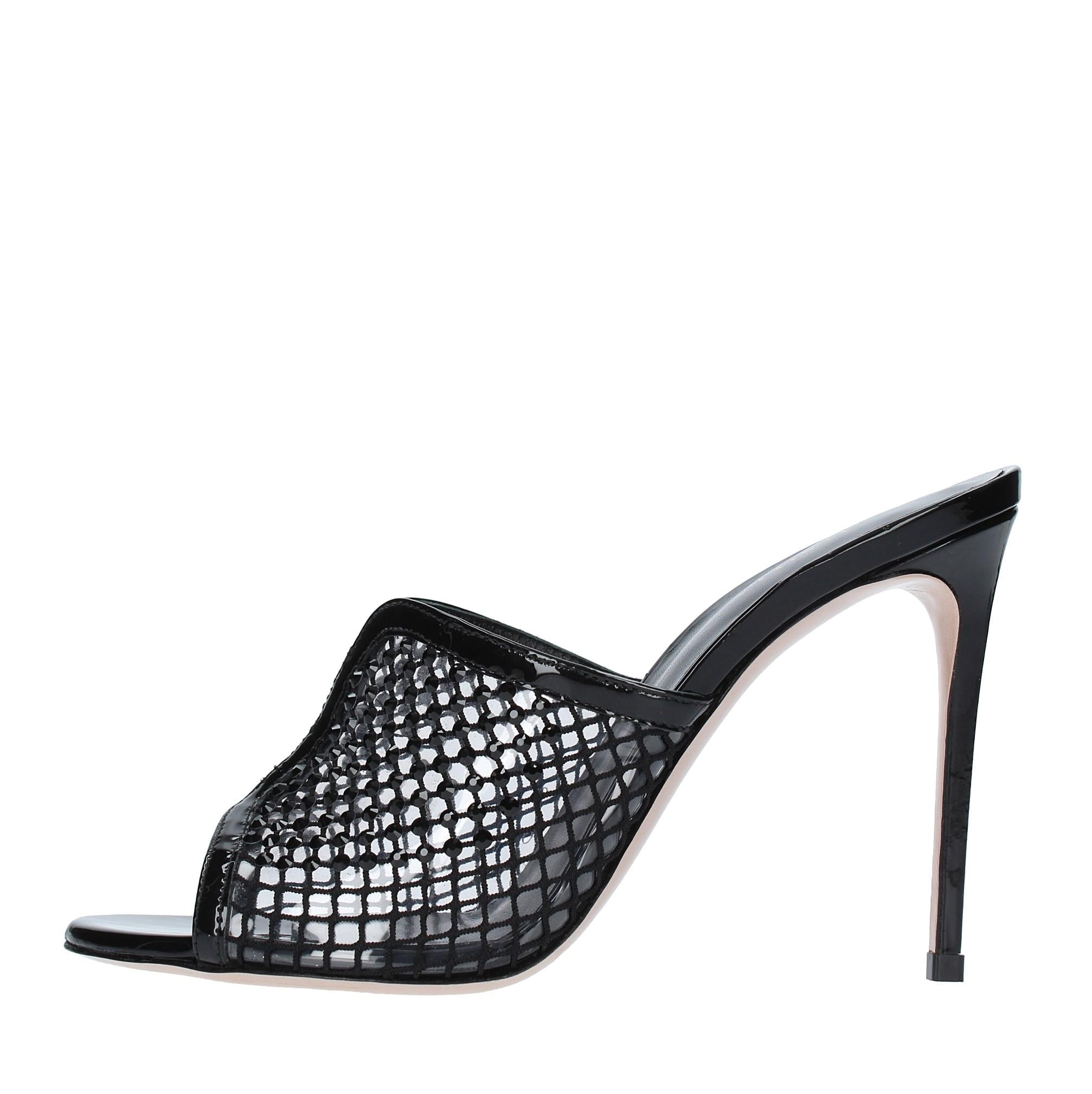 Mules in pelle tessuto e PVC 