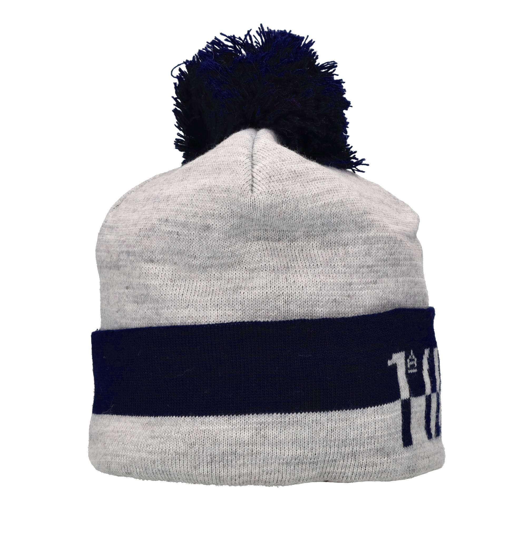 Cappellino con pom-pon in tessuto acrilico 