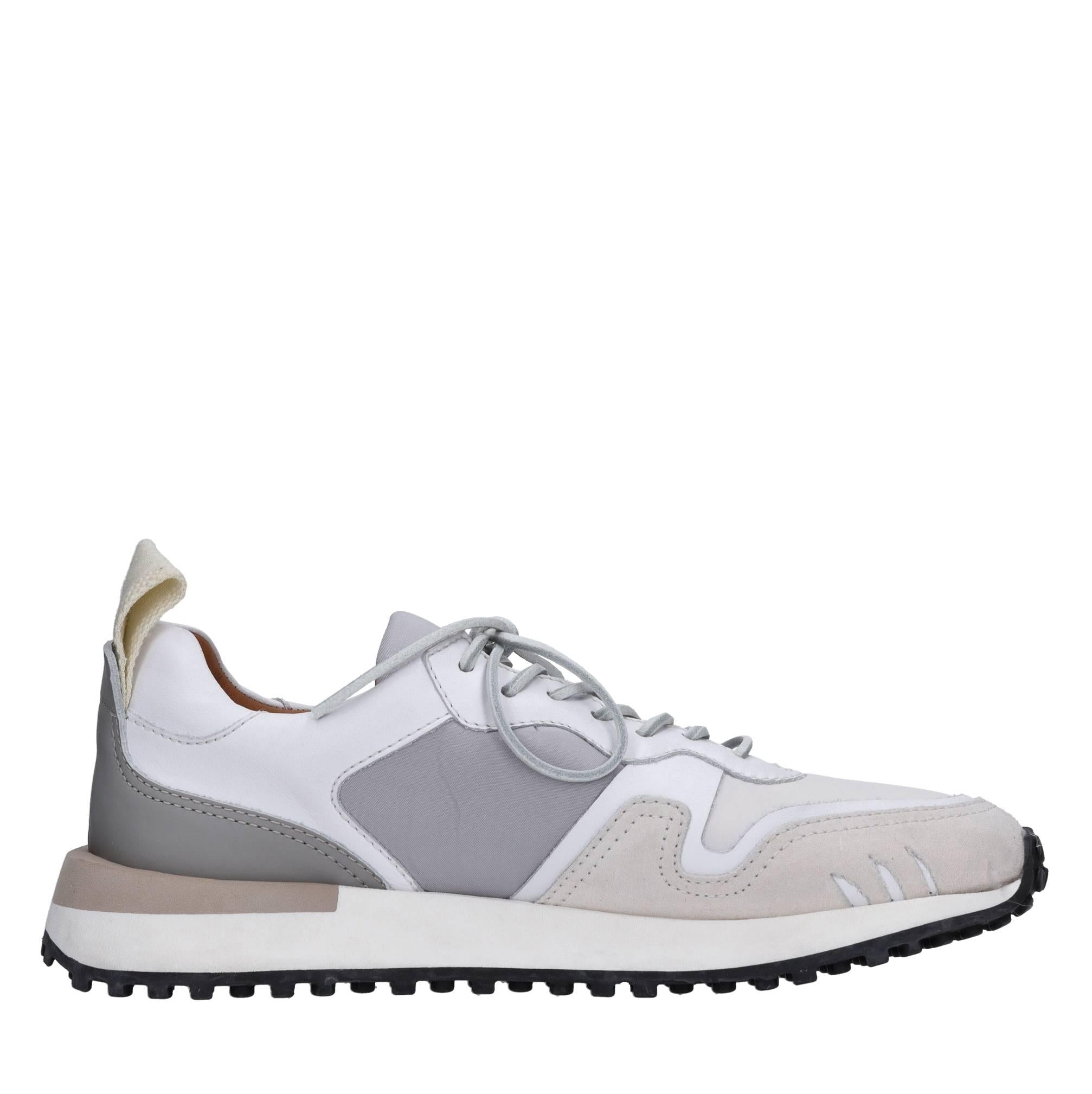 Sneakers in pelle e tessuto 