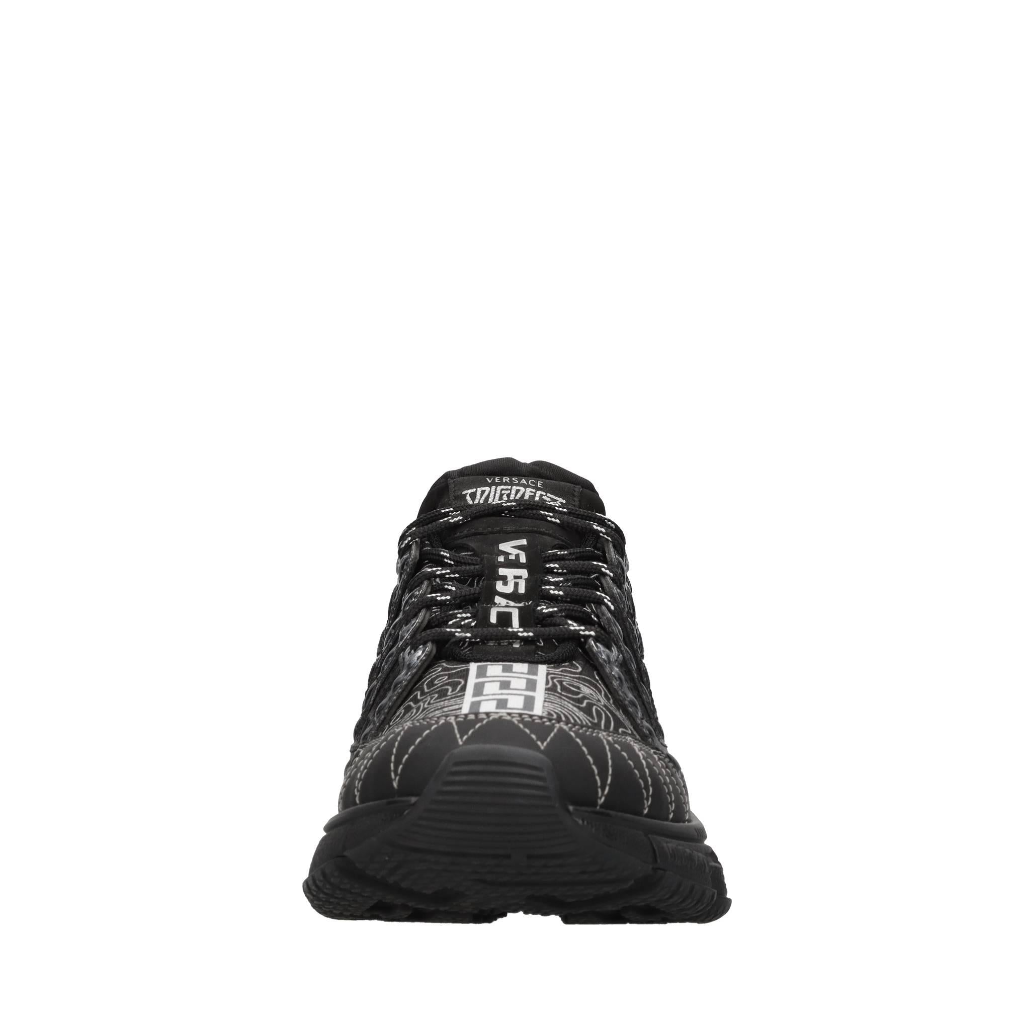 Sneakers in pelle e tessuto 