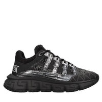 Sneakers in pelle e tessuto 