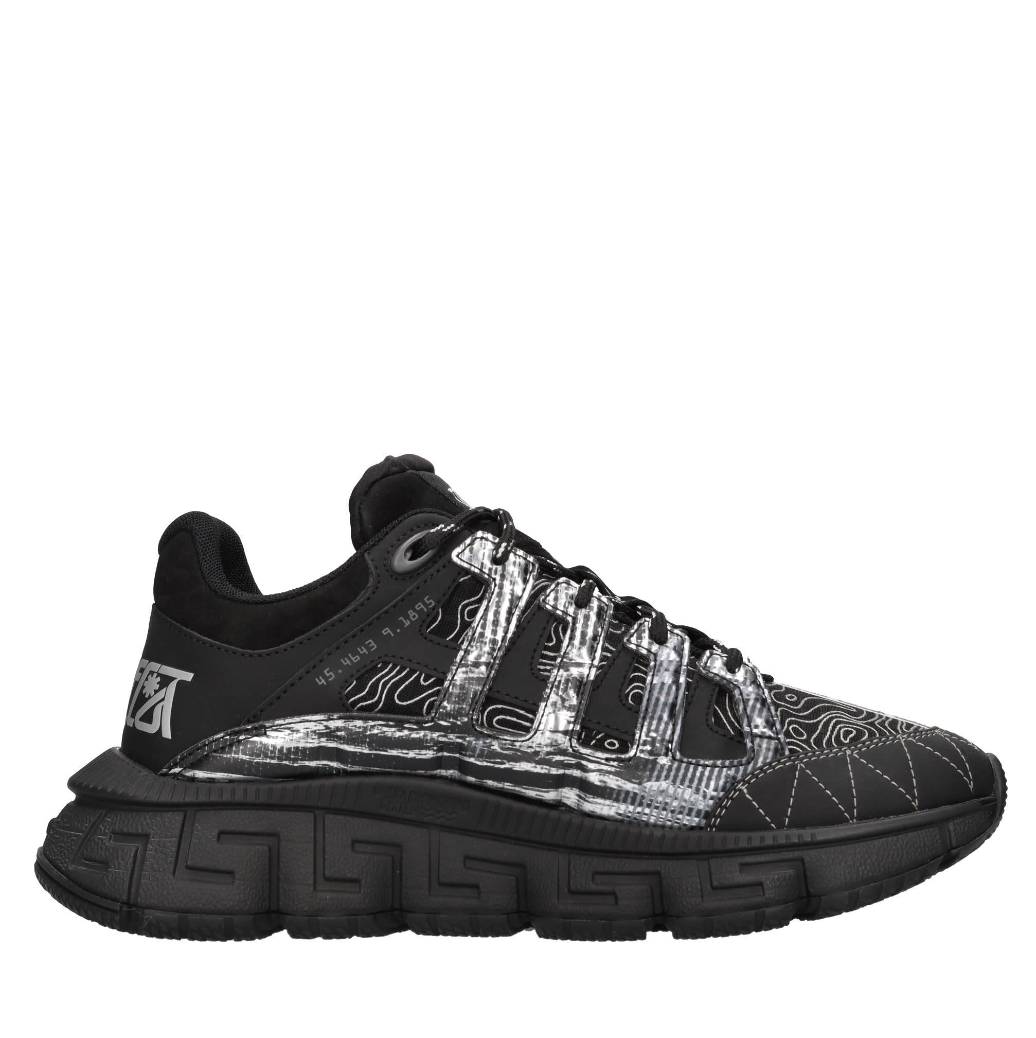 Sneakers in pelle e tessuto 