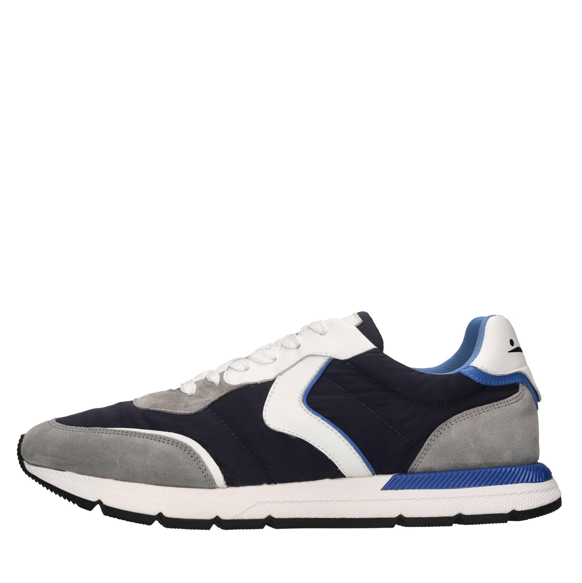 Sneakers in pelle e tessuto 