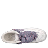 Sneakers in ecopelle e tessuto 