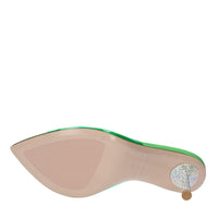Mules in pelle e PVC. 