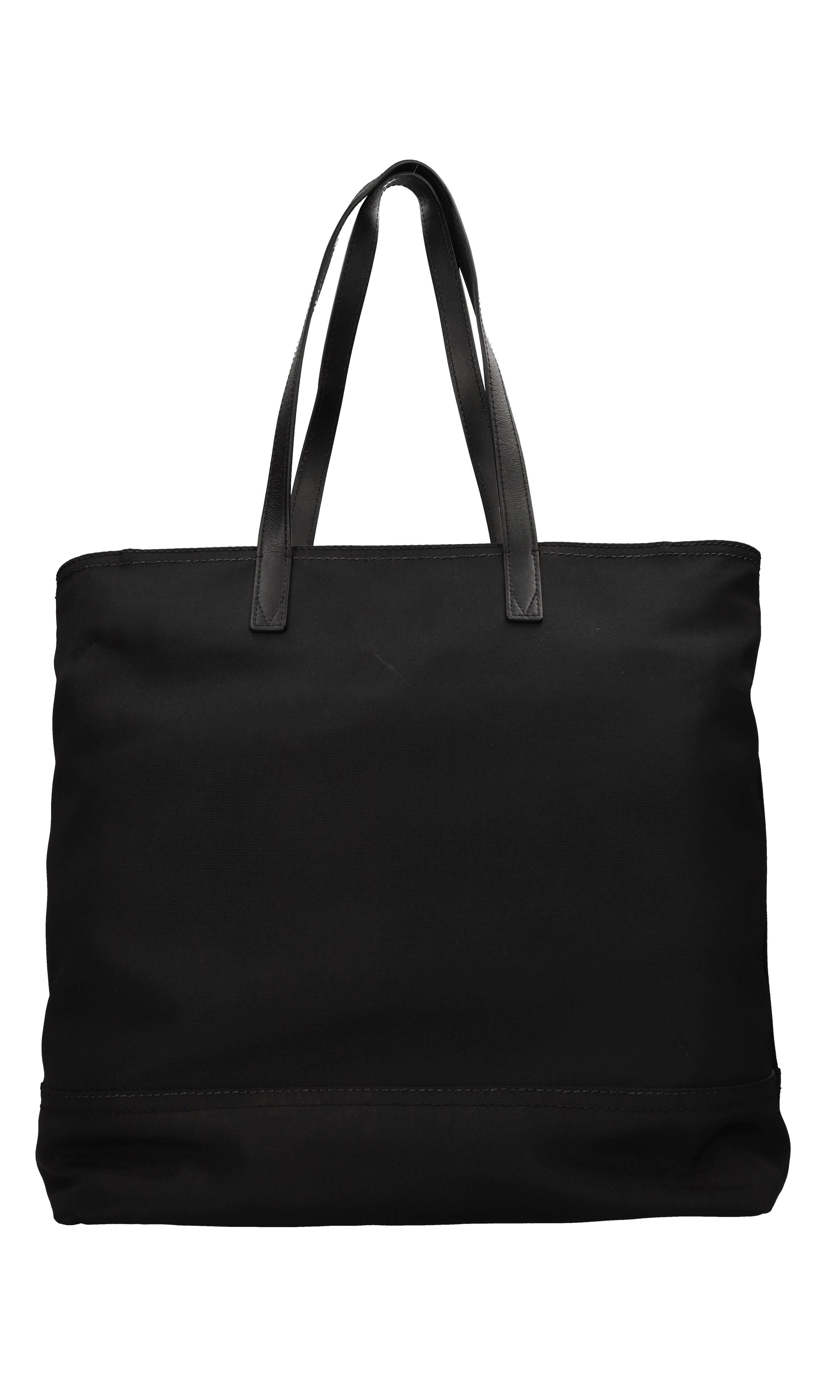 Borsa in tessuto e pelle 