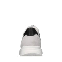 Sneakers in pelle e tessuto 