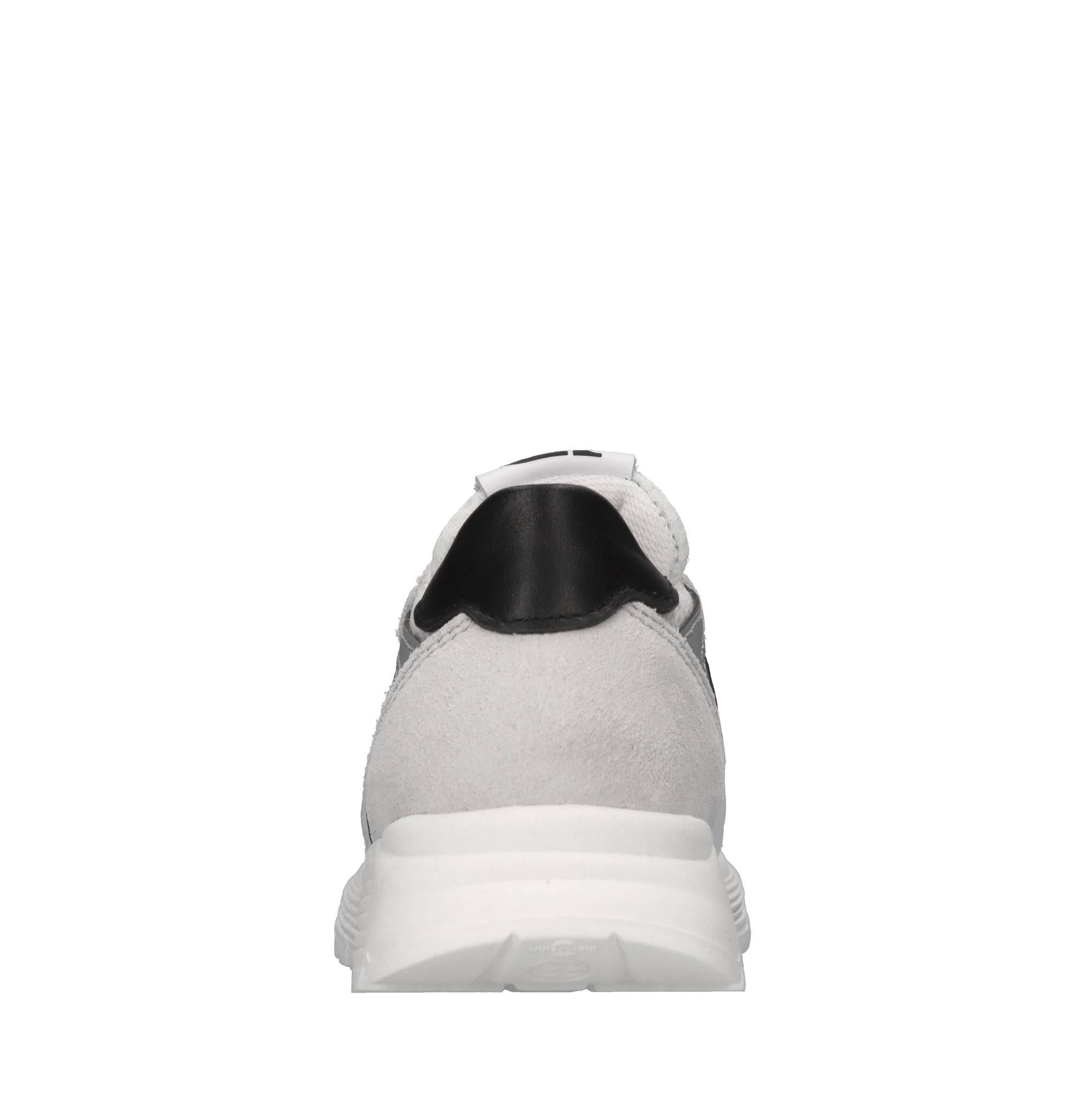 Sneakers in pelle e tessuto 