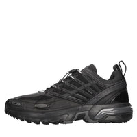 Sneakers in tessuto e materiale sintetico 