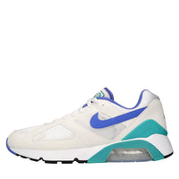 Sneakers in ecopelle e tessuto 