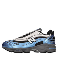 Sneakers in ecopelle e tessuto 