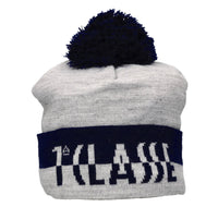 Cappellino con pom-pon in tessuto acrilico 