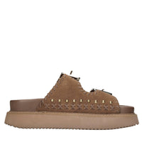 Mules in camoscio e pelle con borchie 