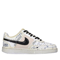 Sneakers in ecopelle e tessuto 