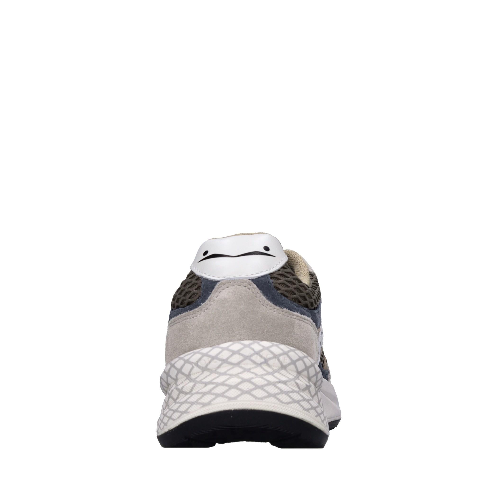 Sneakers in pelle e tessuto 