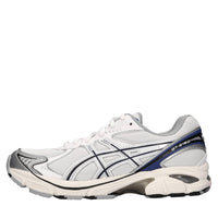 Sneakers in ecopelle e tessuto 
