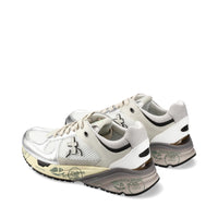 Sneakers in pelle e tessuto 