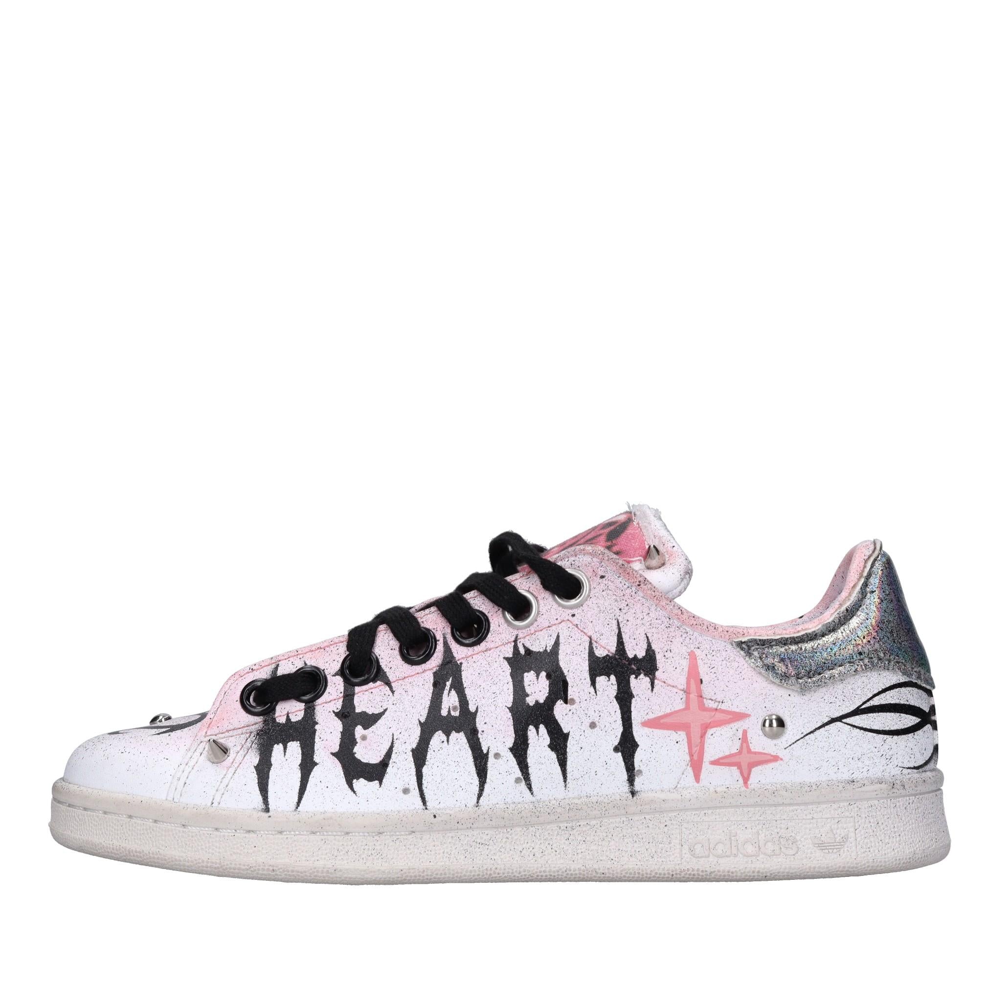 Sneakers in ecopelle e tessuto 